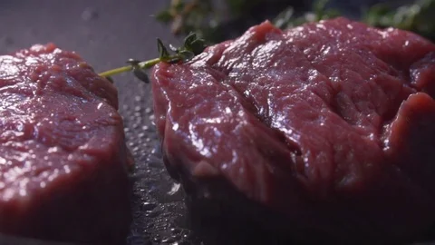 Cook cooks meat Stock Footage 83346473