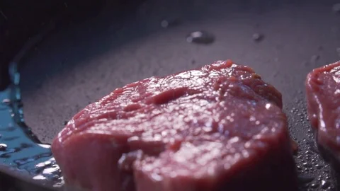 Cook cooks meat Stock Footage 83346487