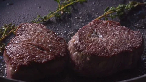 Cook cooks meat Stock Footage 83346690