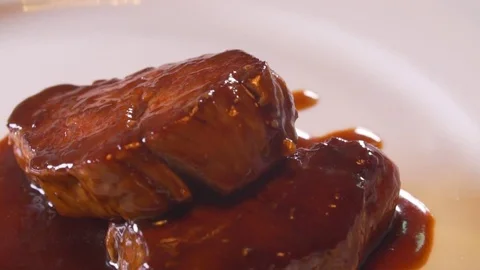Cook cooks meat Stock Footage 83346839
