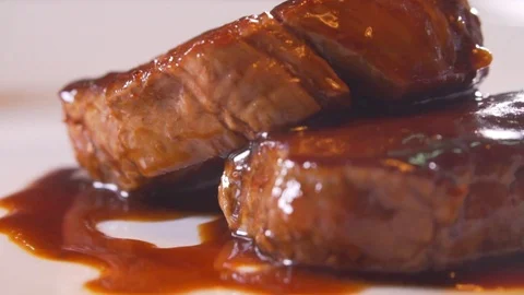 Cook cooks meat Stock Footage 83346884