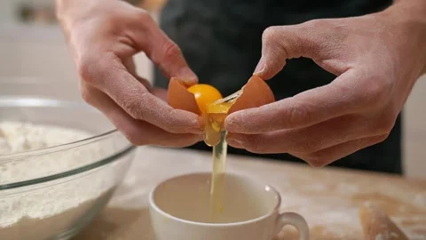 Cook Cracks An Egg Stock Footage 273499505