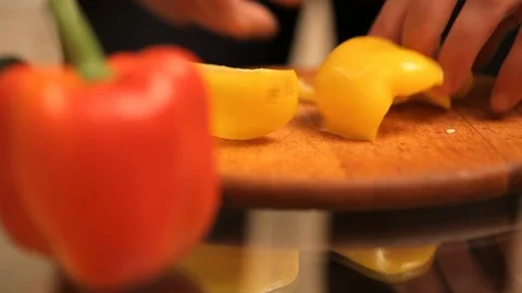 Cook cut yellow pepper Video stock 99807591