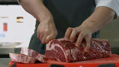 Cook cuts beef meat Stock Footage 147553821