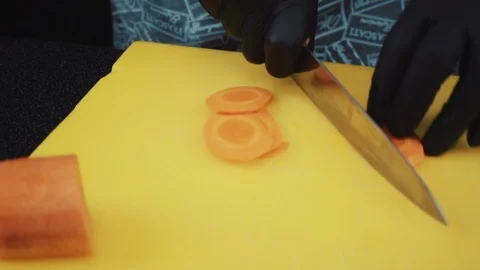 The cook cuts the carrots Stock Footage 88716871