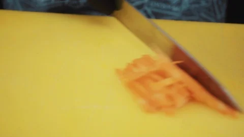 The cook cuts the carrots Stock Footage 88717142
