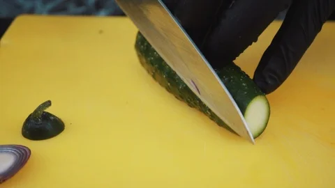 Cook cuts cucumber Stock Footage 88717822