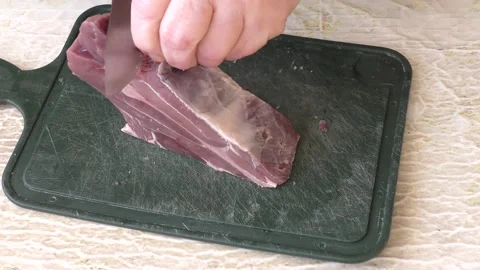 The cook cuts deer meat with a knife. healthy food concept 스톡 동영상 149002053