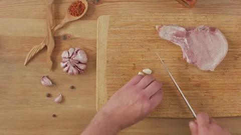 Cook Cuts Garlic Stock Footage 125853465