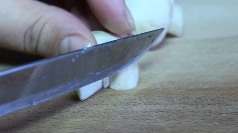 The cook cuts mushrooms Video stock 61453491