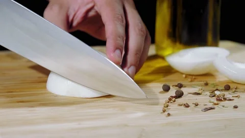The cook cuts the onion Stock Footage 233005148