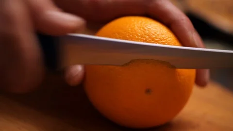 Cook cuts Orange Video stock 99802999