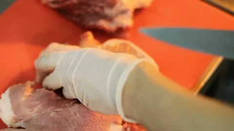 Cook cuts a piece of meat 스톡 동영상 12140388