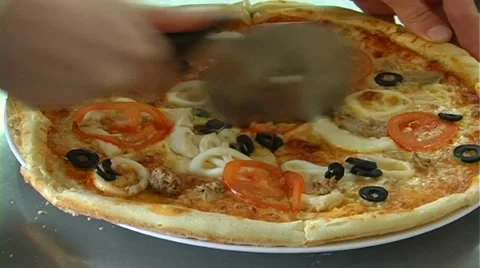 Cook cuts the pizza Stock Footage 61269947