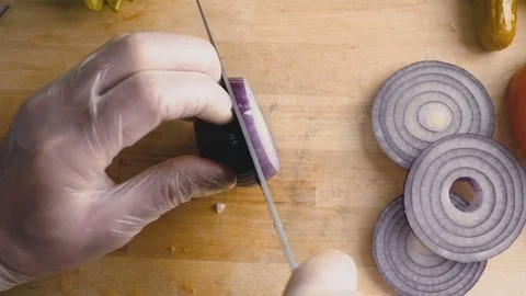 Cook cuts red onion close-up Stock Footage 73760390
