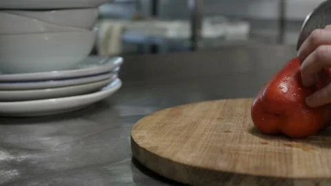 The cook is cutting bell pepper Stock Footage 85818869