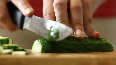 Cook cutting cucumber Video stock 41791489