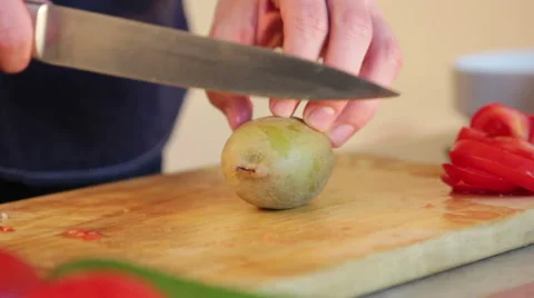 Cook cutting kiwi. Stock Footage 41014719