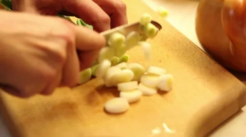 Cook cutting leek in the kitchen Stock Footage 47210539