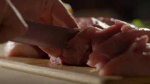 Cook cutting meat. Stock-Footage 91854552