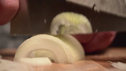 The cook is cutting the onion. Stock Footage 148152521