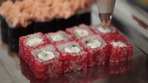 Cook decorates the finished rolls Video stock 106670721