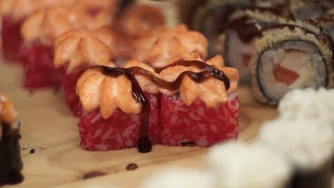 Cook decorates rolls with balsamic vinegar Stock Footage 106670728