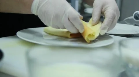 Cook is decorating pancakes 스톡 동영상 48397513