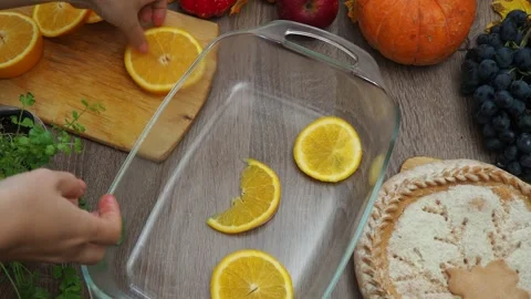 Cook a dinner chicken oranges.  Roasted Turkey. Thanksgiving, Christmas dinner. 스톡 동영상 257590695