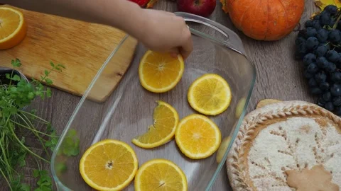 Cook a dinner chicken oranges.  Roasted Turkey. Thanksgiving, Christmas dinner. Stock Footage 257591085