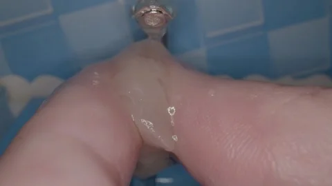 Cook expertly prepares tiny dishes in a charming miniature kitchen showcasing Video stock 286894545