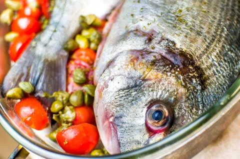 Cook fish Stock Photos