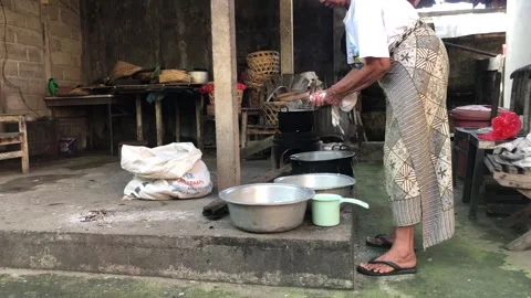 Cook fresh grated coconut to turning it into rich coconut oil  Stock Footage 320810997