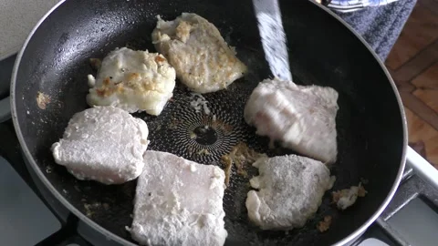 The cook fries the cod fish.  Healthy food concept Stock Footage 155069757