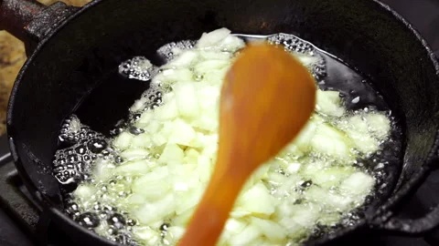 Cook fries onions Stock Footage 104809407