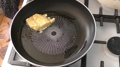 The cook fry the fish in a pan Stock Footage 166708022