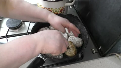 Cook frying cutlets in a pan for dinner Stock Footage 136632000