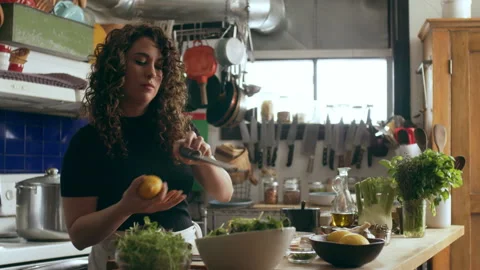 Cook garnishing octopus on a plate creating an octopus carpaccio dish and servin Video stock 199455223