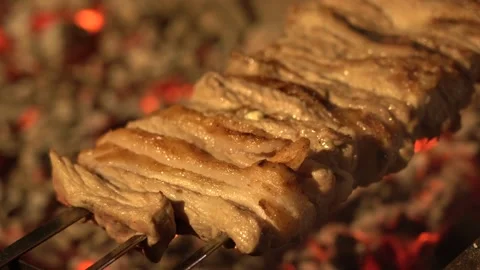 The cook greases the meat Video stock 154887110