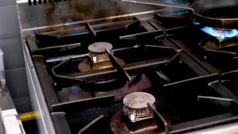 Cook hands placing a piece of chichen meat Stock Footage 95946697