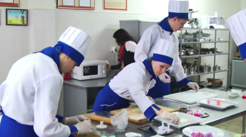 Cook in Kitchen Making Sweets 1 Stock Footage 34522700