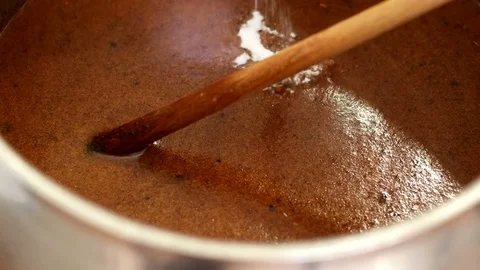 Cook is in the Kitchen Preparing a Cake Stock Footage 75591112
