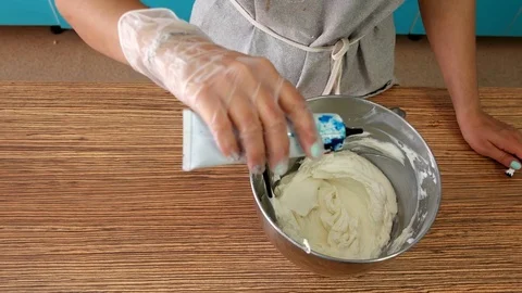 Cook in the Kitchen Preparing Cream Stock Footage 75587807