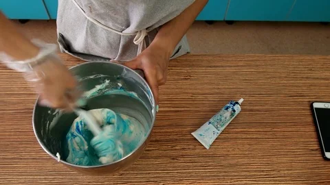 Cook in the Kitchen Preparing Cream Stock Footage 75588305