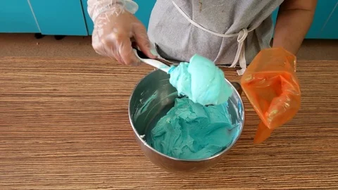 Cook in the Kitchen Preparing Cream Stock Footage 75588567