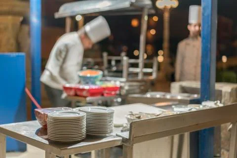 Cook in the kitchen. selected focus Stock Photos