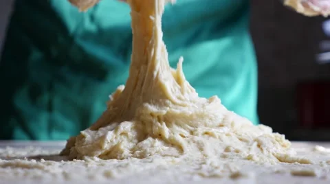 Cook kneading dough Stock Footage 49807154
