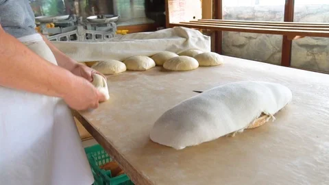 Cook kneads dough in kitchen, makes buns, khachapuri. close-up. Stock Footage 113267664