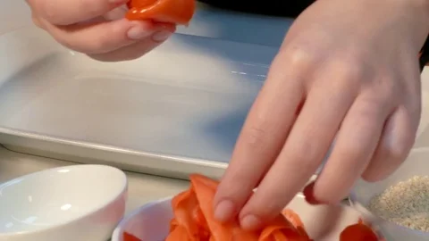 The cook makes a beautiful serving of sushi. Fast moving. Video stock 85420478