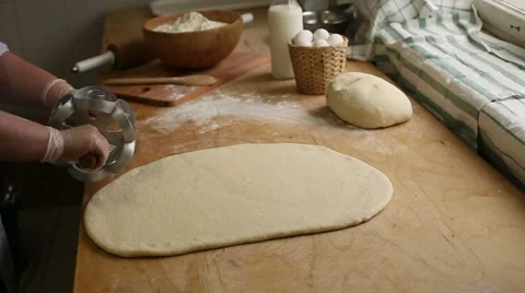 Cook makes billets donuts Stock Footage 64727294